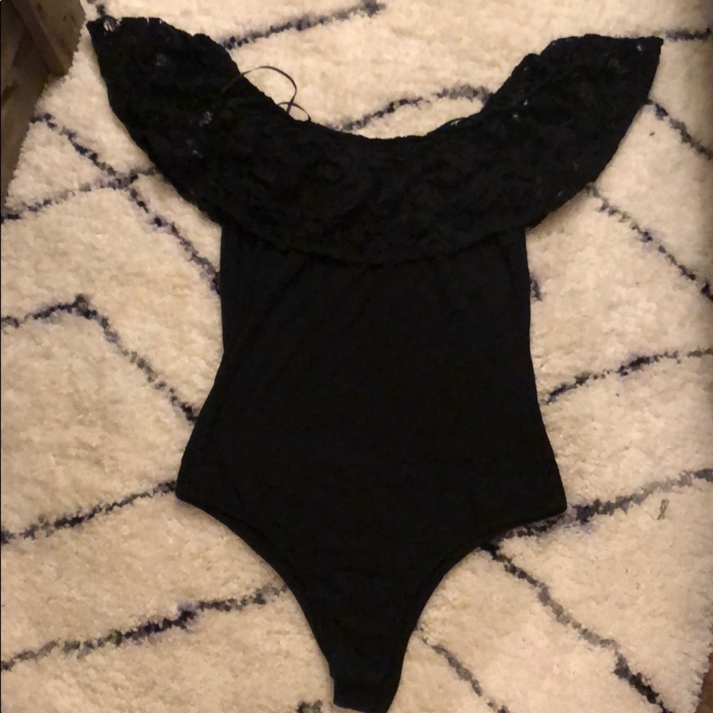 Off-the-shoulder black bodysuit